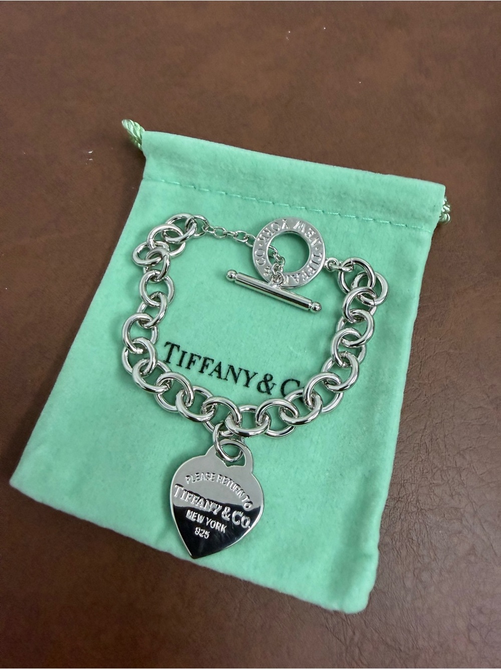 Tiffany & Co. Silver Heart Tag Toggle Bracelet with Blue-Green Pouch